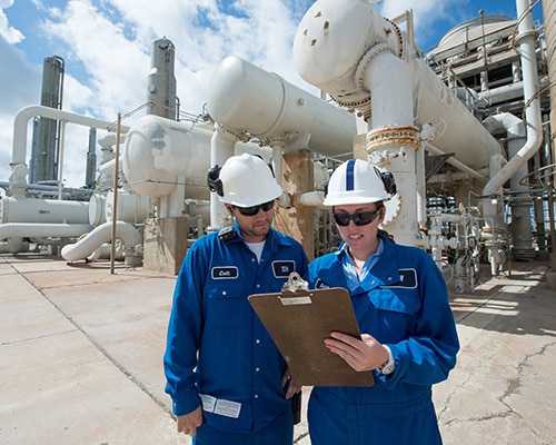 2 workers at a factory